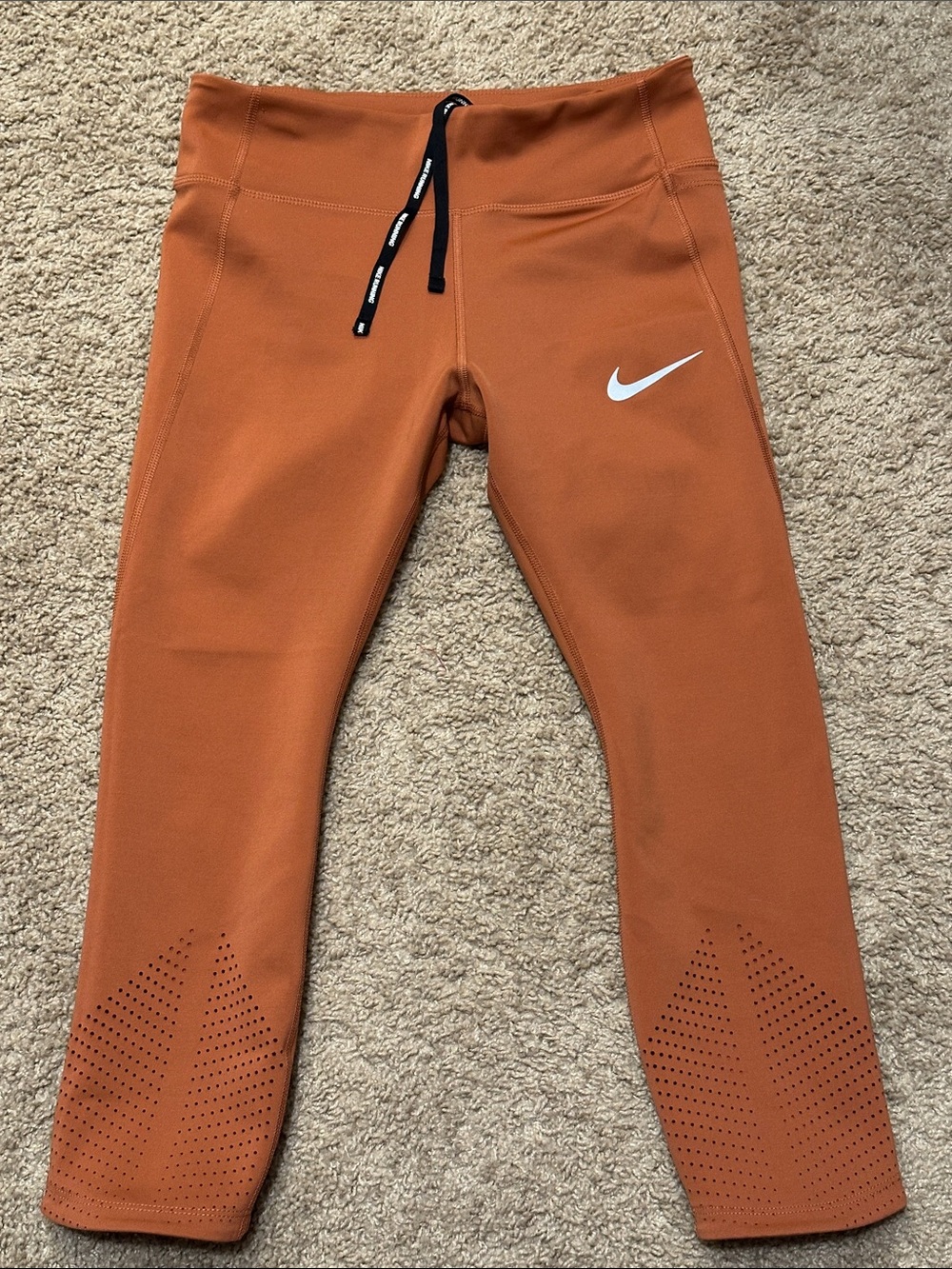 Nike Women’s Rust Orange Performance Leggings